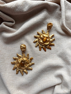Handcrafted draped sun statement earring, sculpted with tigers eye cabochons