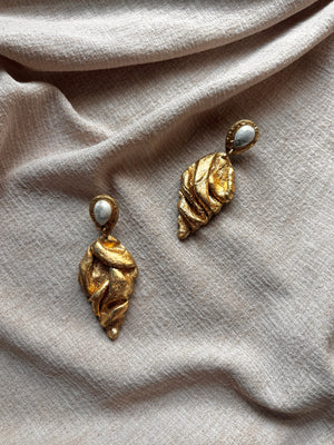 Ava & Azar handcrafted draped sculptural Fariba statement earrings with white Howlite stones