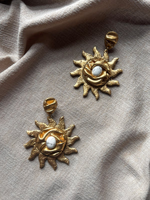 Ava & Azar handcrafted gold statement earrings blazing sun draped with white Howlite semi precious stones