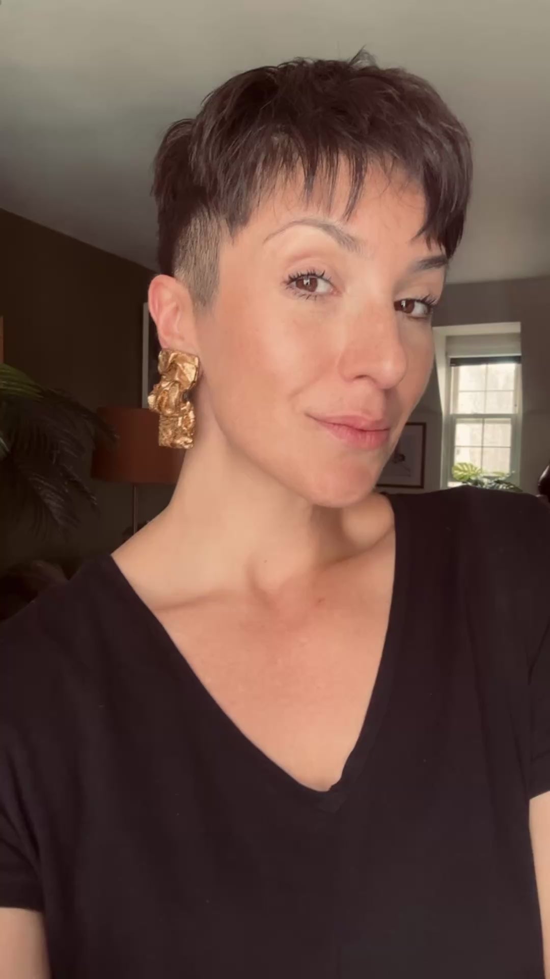 Model wearing the Zibaara statement earrings by Ava & Azar