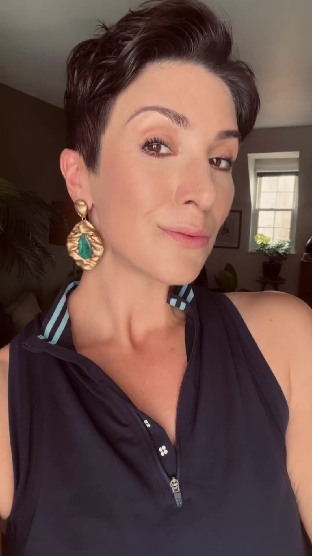 Model wearing Ava & Azar Mahin Draped earrings with Shattuckite stones