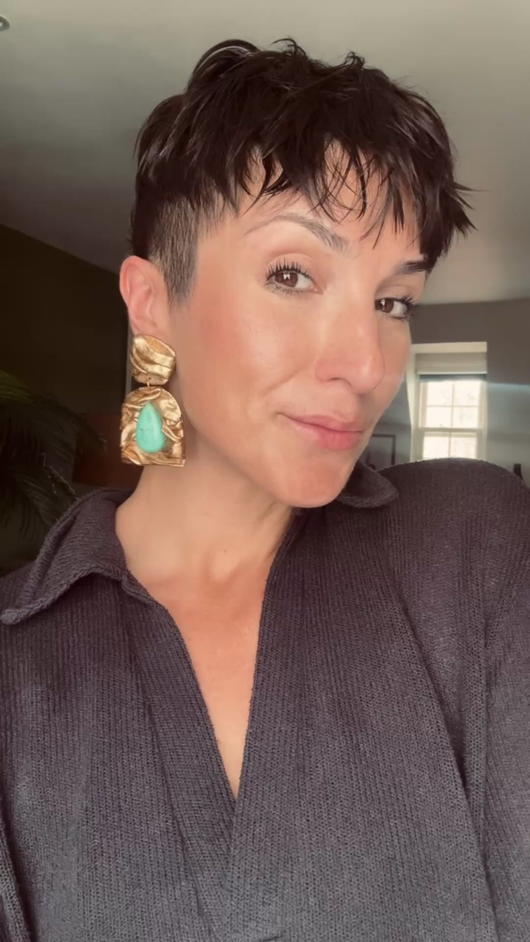 Model wearing Ava & Azar Farideh handcrafted earring